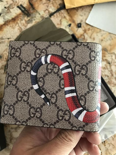 nina's gucci snake wallet replica vs retail breakdown self.designerreps|gucci wallet stitches longer.